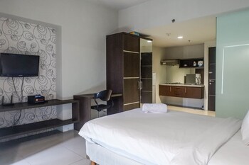 classic modern studio room apartment at the square surabaya