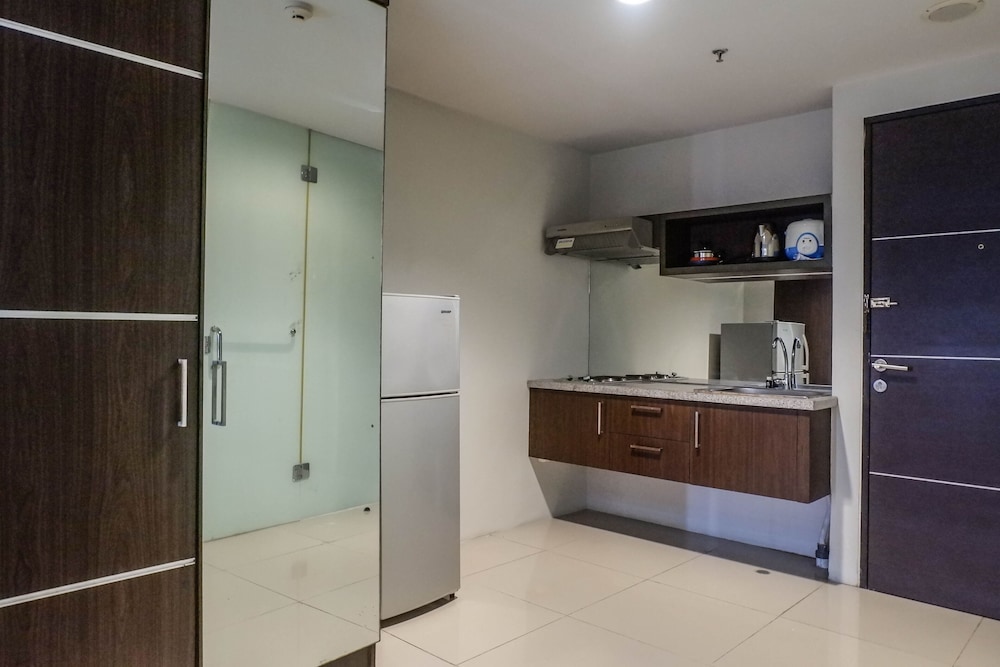 classic modern studio room apartment at the square surabaya