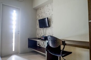 classic modern studio room apartment at the square surabaya