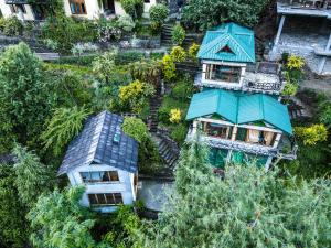 the whispering woods tirthan valley