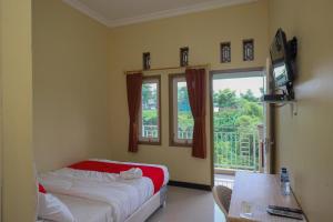 oyo 90516 rgh syariah argopeni