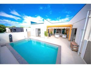 churaumi village pool and terrace