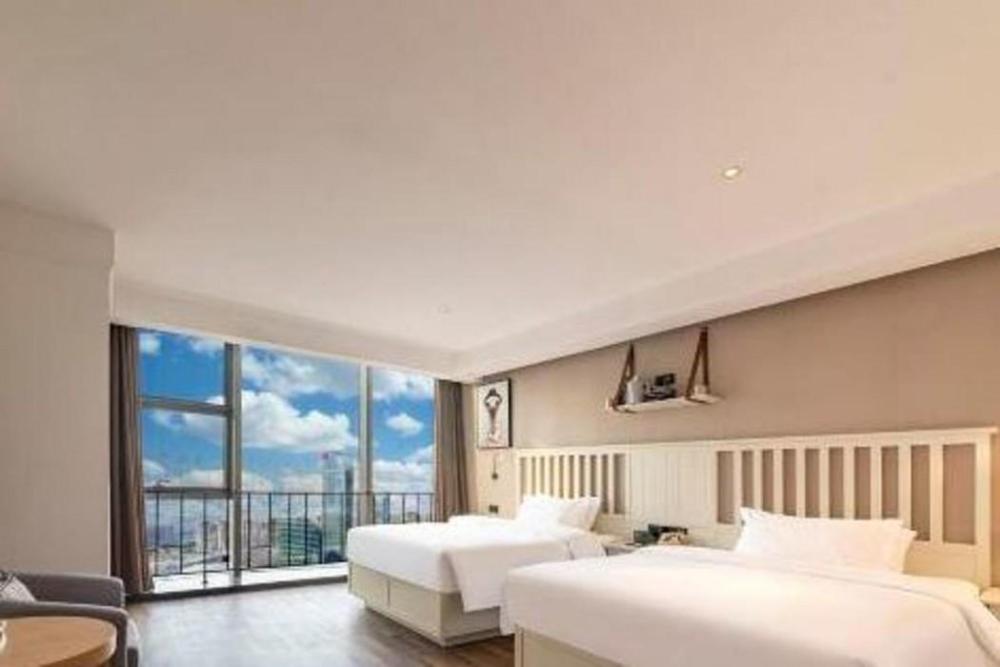 borrman hotel jinan west station greenland central plaza