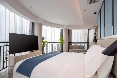 echarm hotel haikou youyi yangguang chengqiao middle road