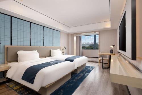 echarm hotel haikou youyi yangguang chengqiao middle road