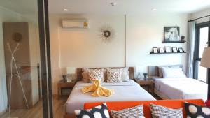 rain cha am pool view by obbset