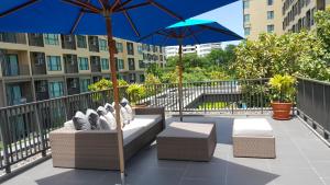 rain cha am pool view by obbset