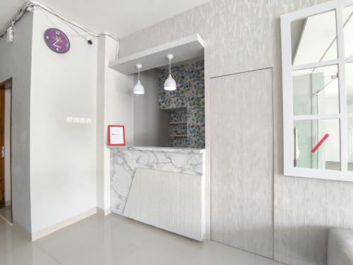 reddoorz syariah near gor satria area