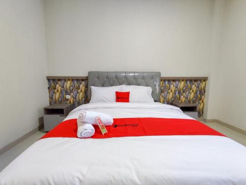 reddoorz syariah near gor satria area