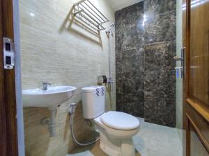 reddoorz syariah near gor satria area