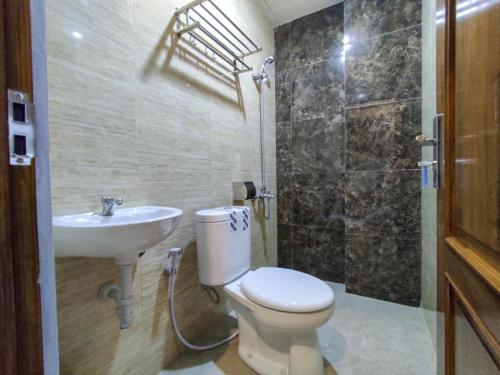 reddoorz syariah near gor satria area