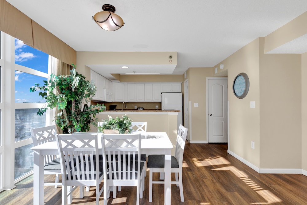 stunning condo with wall to wall windows overlooking ocean