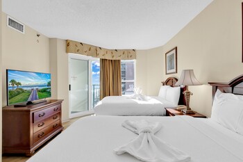 stunning condo with wall to wall windows overlooking ocean