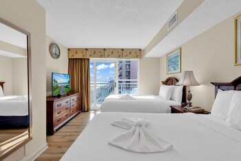 stunning condo with wall to wall windows overlooking ocean