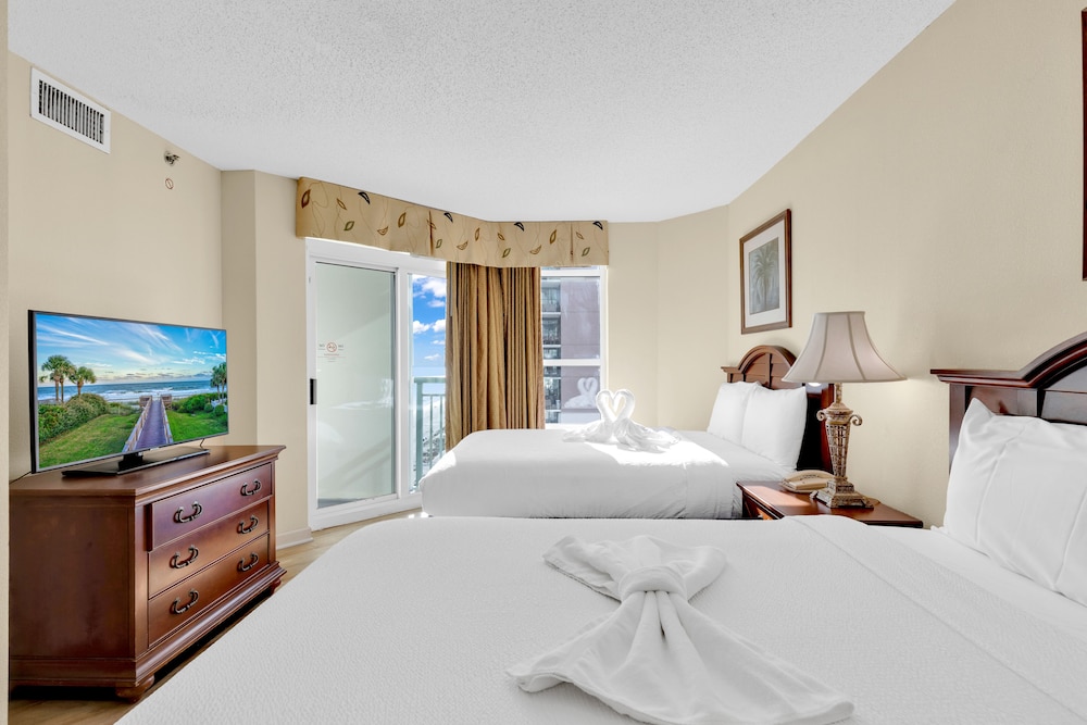 stunning condo with wall to wall windows overlooking ocean