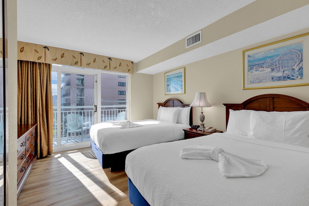 stunning condo with wall to wall windows overlooking ocean