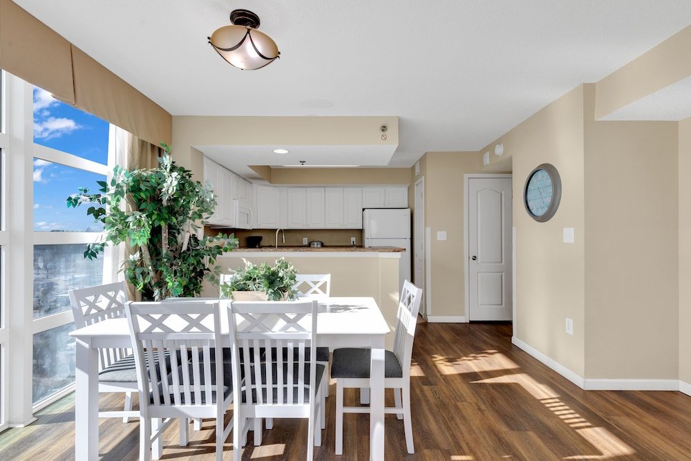 stunning condo with wall to wall windows overlooking ocean