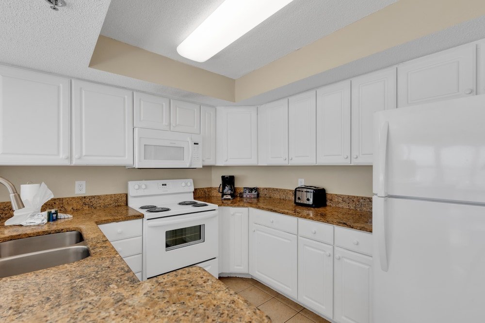 stunning condo with wall to wall windows overlooking ocean