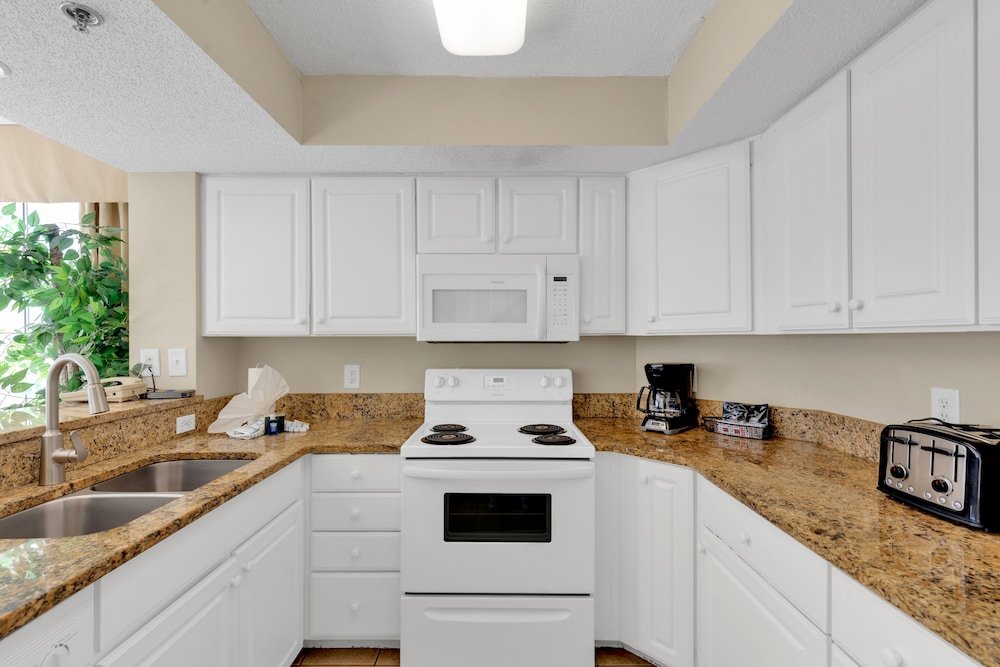 stunning condo with wall to wall windows overlooking ocean