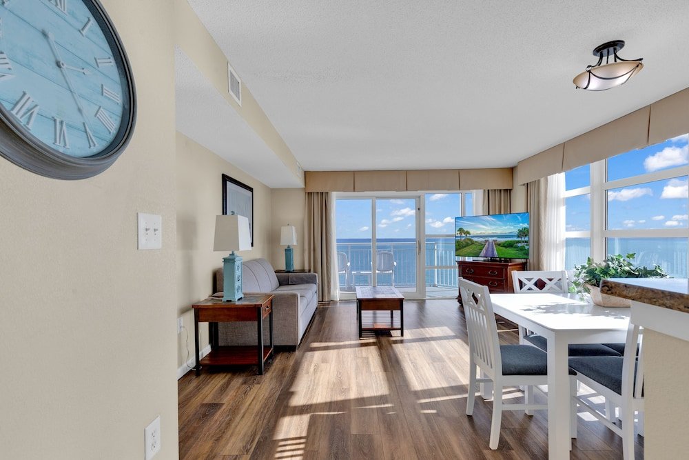 stunning condo with wall to wall windows overlooking ocean