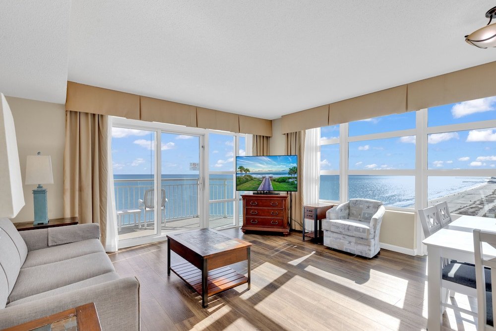 stunning condo with wall to wall windows overlooking ocean