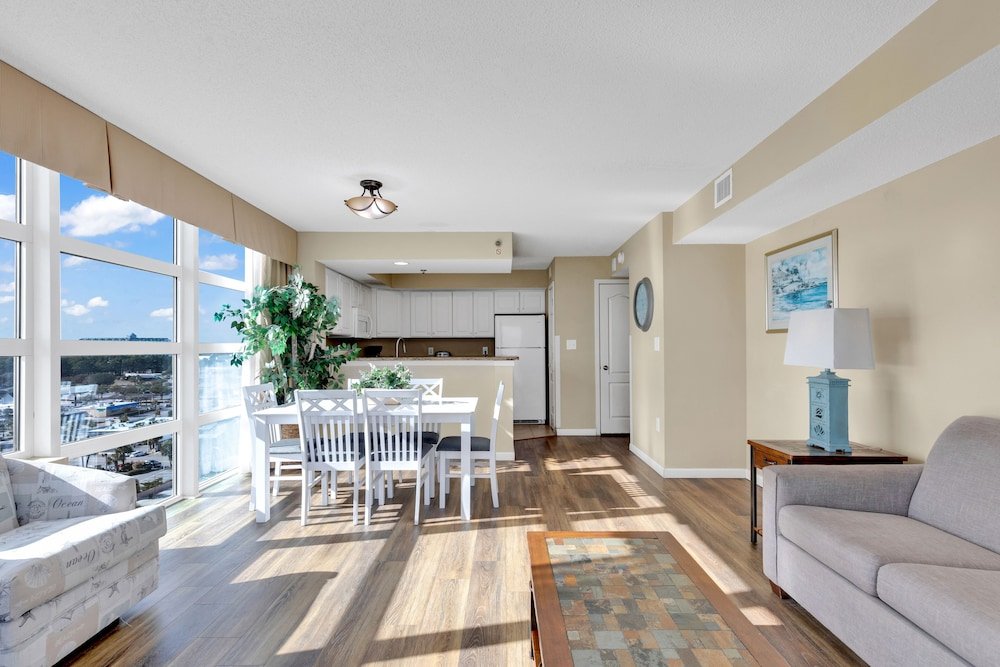 stunning condo with wall to wall windows overlooking ocean