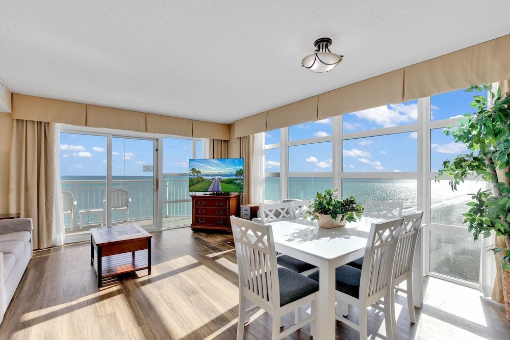 stunning condo with wall to wall windows overlooking ocean