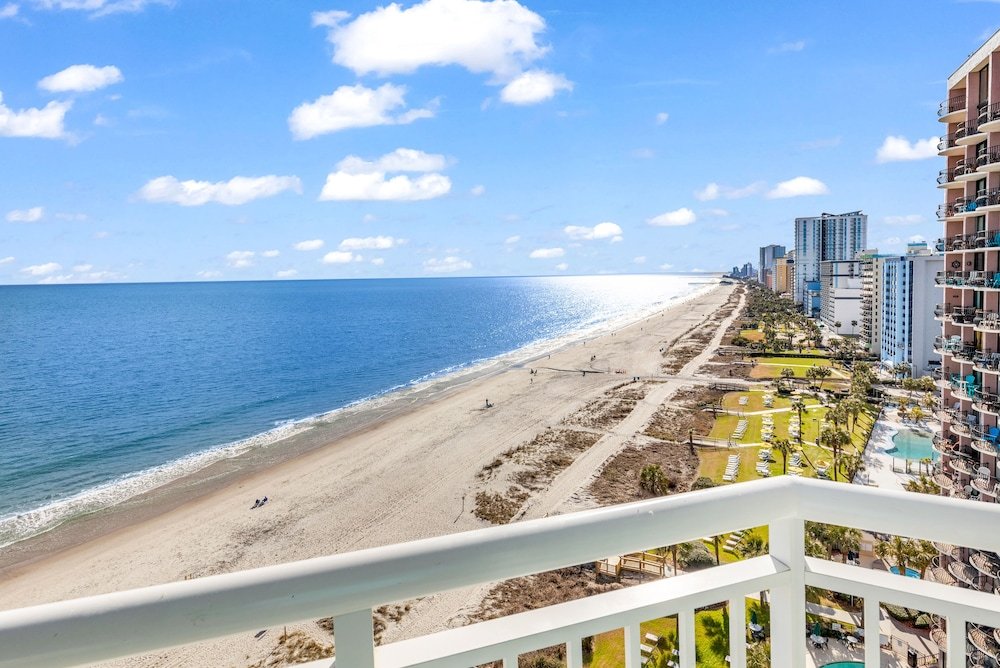 stunning condo with wall to wall windows overlooking ocean