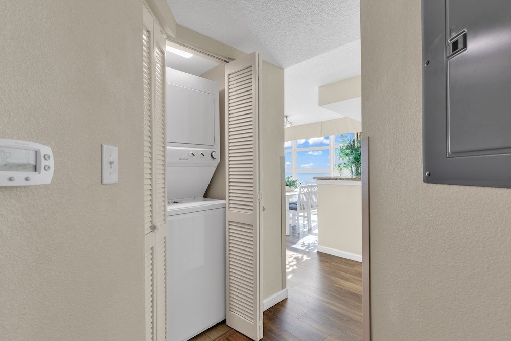 stunning condo with wall to wall windows overlooking ocean