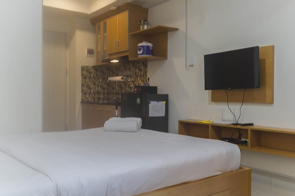 comfy and homey studio room at grand kamala lagoon apartment