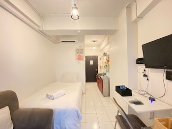 cozy studio room at grand asia afrika apartment