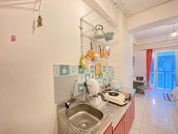 cozy studio room at grand asia afrika apartment