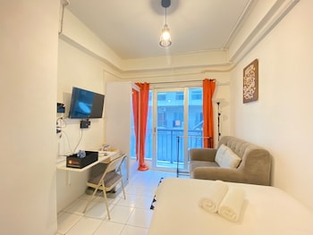 cozy studio room at grand asia afrika apartment