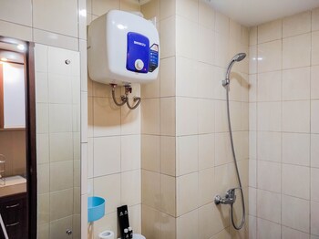 homey and comfy studio at vida view makasar apartment