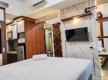 homey and comfy studio at vida view makasar apartment