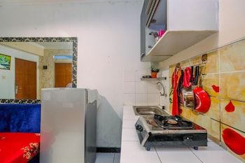 homey and compact 2br cibubur village apartment