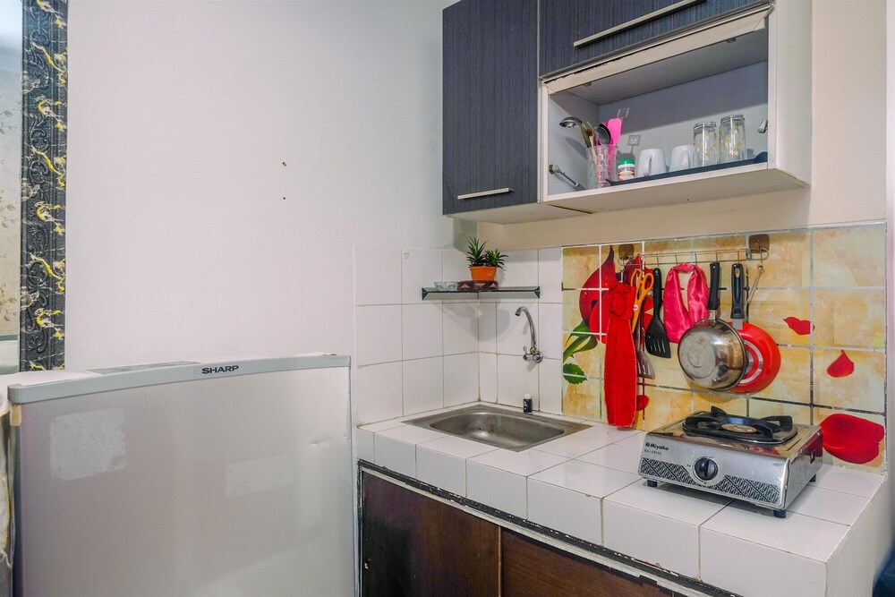 homey and compact 2br cibubur village apartment