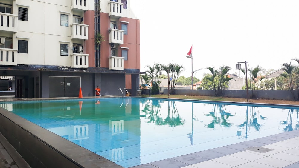 homey and compact 2br cibubur village apartment