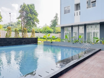 minimalist studio room at urbantown serpong apartment
