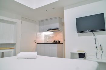minimalist studio room at urbantown serpong apartment