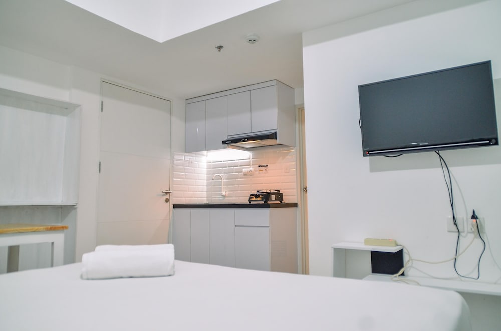 minimalist studio room at urbantown serpong apartment