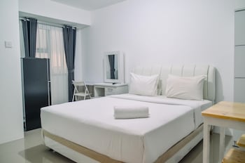minimalist studio room at urbantown serpong apartment