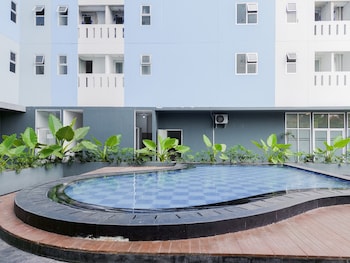 minimalist studio room at urbantown serpong apartment