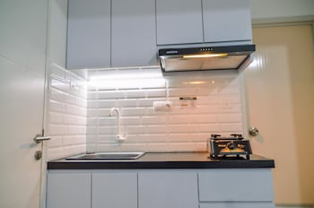 minimalist studio room at urbantown serpong apartment
