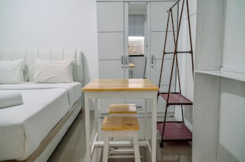 minimalist studio room at urbantown serpong apartment