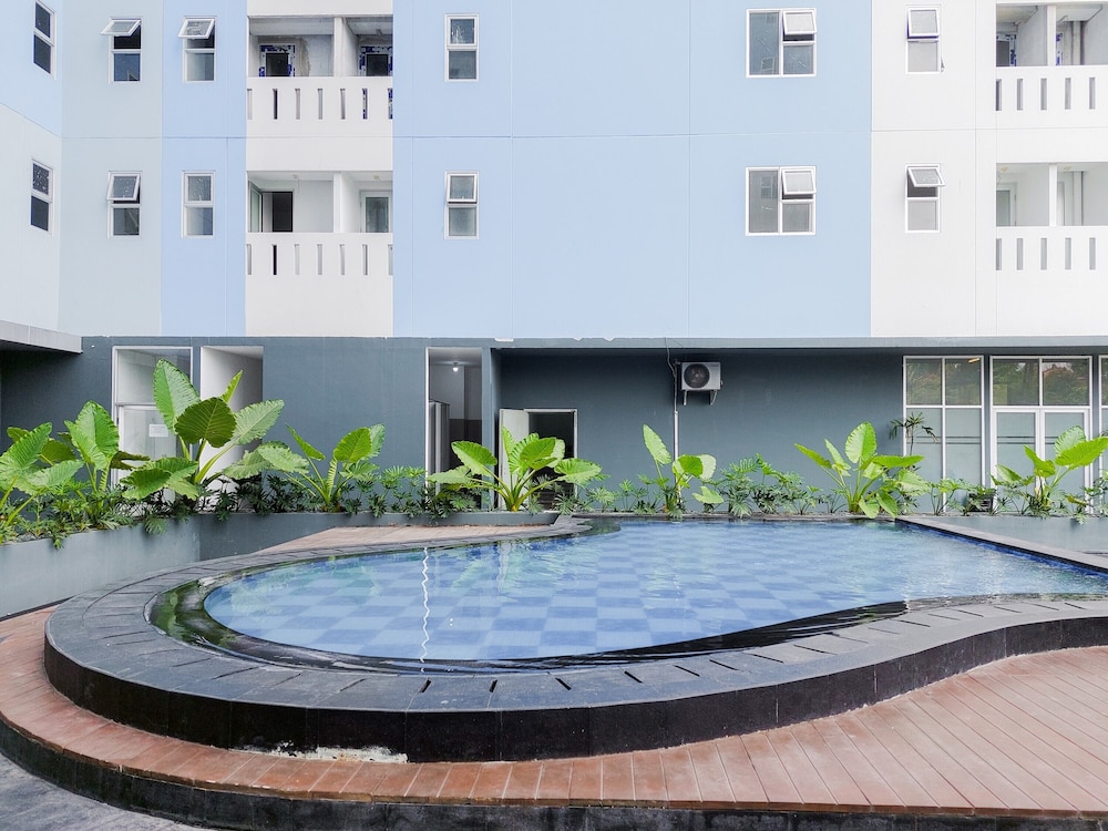 minimalist studio room at urbantown serpong apartment