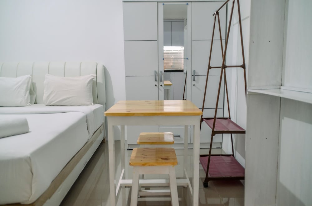 minimalist studio room at urbantown serpong apartment