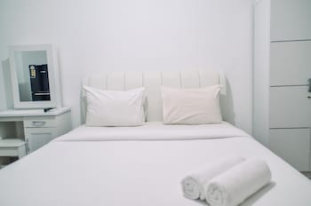 minimalist studio room at urbantown serpong apartment