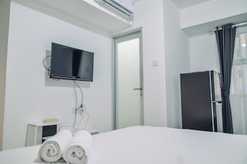 minimalist studio room at urbantown serpong apartment