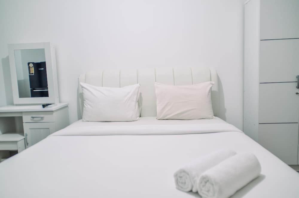 minimalist studio room at urbantown serpong apartment